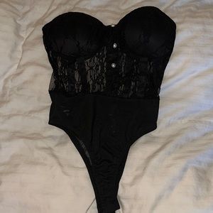 Brand new Nanamacs strapless lingerie top with padded bra and pearls.